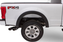 Load image into Gallery viewer, Bushwacker 16-18 Nissan Titan XD Pocket Style Flares 4pc 78.0in Bed - Black